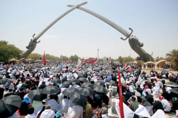 Sadrist Movement followers during last Friday prayers in Baghdad (AP)