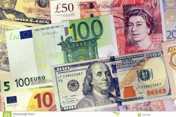 صورة تُظهر أوراقاً نقدية من عملات الدولار واليورو والجنيه الإسترليني (نقلاً عن موقع: dreamstime.com)