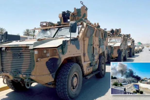 بکتر بند گاڑیوں کو کل طرابلس کی طرف روانہ ہوتے ہوئۓ دیکھا جا سکتا ہے اور دائرہ میں تصادم کے دوران شہر کے ایک مقام سے اٹھتے دھوئیں کو دیکھا جا سکتا ہے (رائٹرز)