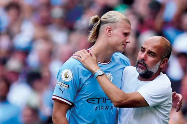 غوارديولا منفتح على الأفكار الجديدة بوجود هالاند (أ.ف.ب)