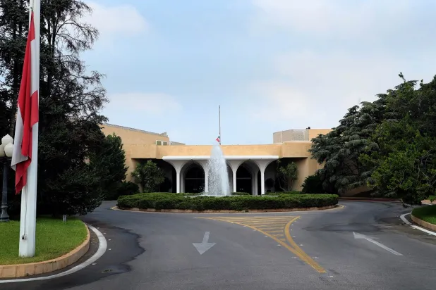 Lebanese national flags fly at half-mast outside the presidential palace as Lebanon marks the two-year anniversary of the August 2020 Beirut port explosion, in Baabda Lebanon August 4, 2022. (Dalati & Nohra)