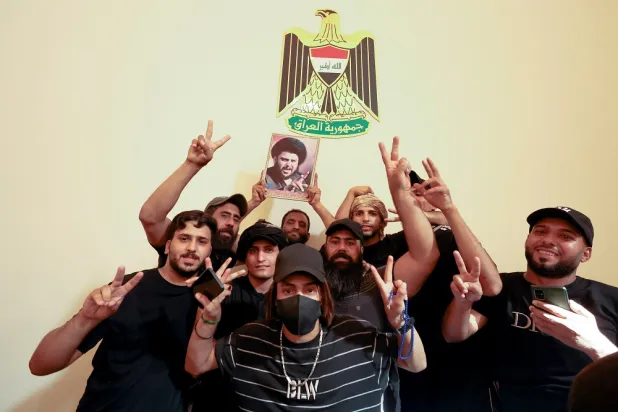 Supporters of Iraqi cleric Moqtada al-Sadr protest at the Green Zone, in Baghdad, Iraq August 29, 2022. (Reuters)