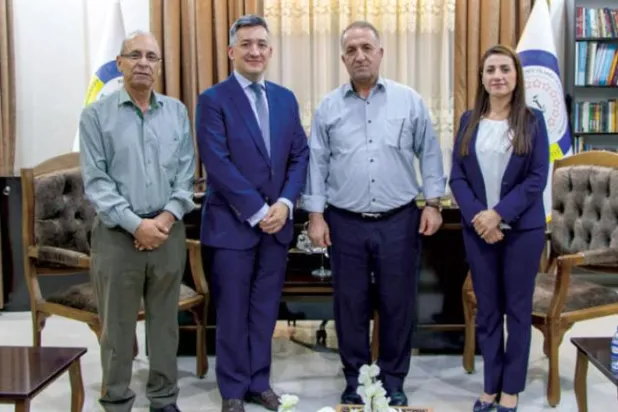 US envoy Nicholas Granger (second left) during his meeting with leaders of the Kurdish Autonomous Administration in the city of Qamishli. (Asharq Al-Awsat)