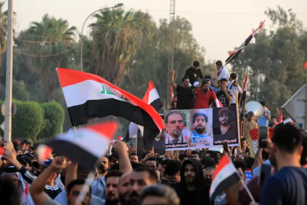 من تظاهرات بعداد أمس (إ.ب.أ)