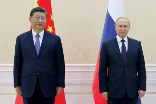 پوٹن اور شی کل سمرقند میں "شنگھائی سربراہی اجلاس" کے موقع پر (اے پی)