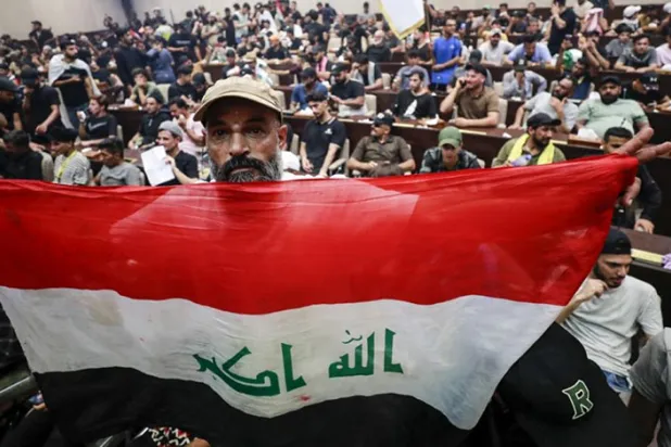 Irak'ta yaşanan siyasi kriz, çözümsüzlüğe ve hiçbir sonuç getirmeyen girişimlerin başarısız olmasına yol açtı (AFP)