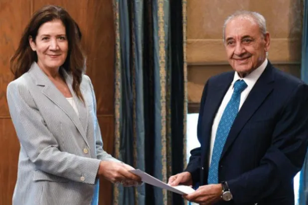 US Ambassador to Lebanon Dorothy Shea (L) presents a letter to Lebanon's Parliament Speaker Nabih Berri (R) during their meeting at Berri's house in Beirut, Lebanon, 01 October 2022. EPA/WAEL HAMZEH