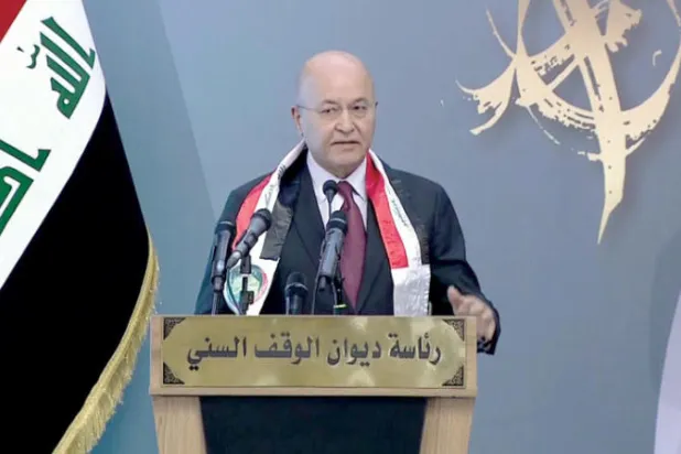 الرئيس صالح يلقي كلمته لدى مشاركته في احتفالية بمناسبة المولد النبوي الشريف في الأعظمية أمس (الرئاسة العراقية)
