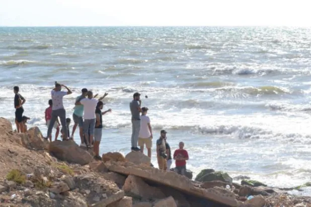 Lebanese people await survivors or victims of a boat sinking off the Arida crossing with Syria. (AFP) 