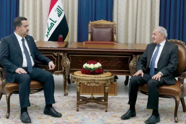 کل صدر عبد اللطیف جمال رشید اور نامزد وزیر اعظم کو ملاقات کے دوران دیکھا جا سکتا ہے (عراقی نیوز ایجنسی)