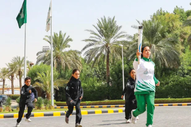 ربى المصري نجمة المبارزة حاملة شعلة دورة الألعاب السعودية (الاتحاد السعودي للمبارزة)