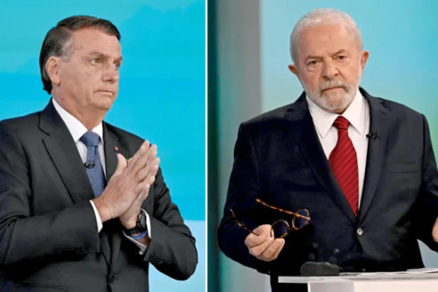 لولا وبولسونارو يشاركان في آخر مناظرة تلفزيونية الجمعة (أ.ف.ب)