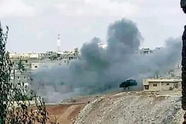 Aktivistler pazartesi günü, Dera el-Beled'de DEAŞ’la yaşanan çatışmalara ilişkin fotoğraflar yayınladılar.