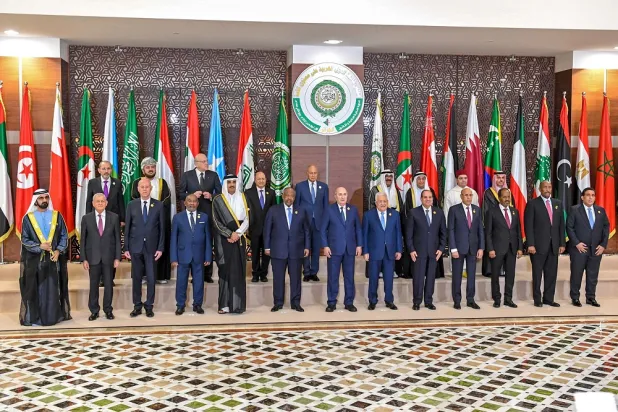 A handout picture provided by the Tunisian presidency press service shows Arab leaders posing for a group photo in the Algerian capital on November 1, 2022. (AFP / Handout/ Tunisian presidency press)
