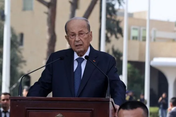 Lebanon's former President Michel Aoun delivers a speech to mark the end of his mandate, outside the presidential palace in Baabda, east of the capital Beirut, on October 30, 2022. (AFP)  

