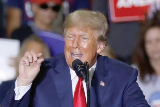 Donald Trump, 1 Ekim’de Michigan eyaletindeki bir mitingde konuşma yaptı. (AFP)