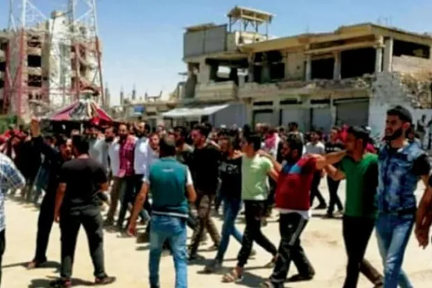 Dera el-Balad şehrinde, rejime karşı düzenlenen eski bir protesto gösterisi (Arşiv)