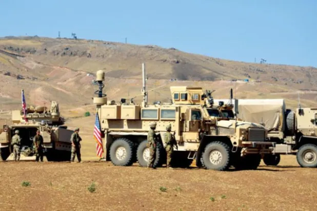 US forces conduct training with the "Syrian Democratic Forces" in Hasaka countryside on September 7 (EPA)
