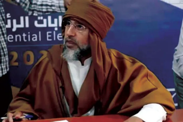 سيف الإسلام القذافي لدى ترشحه للانتخابات الرئاسية نهاية 2021 (مفوضية الانتخابات)
