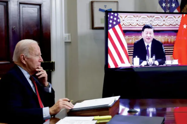 لقاء بالفيديو بين بايدن وشي في 15 نوفمبر 2021 (رويترز)
