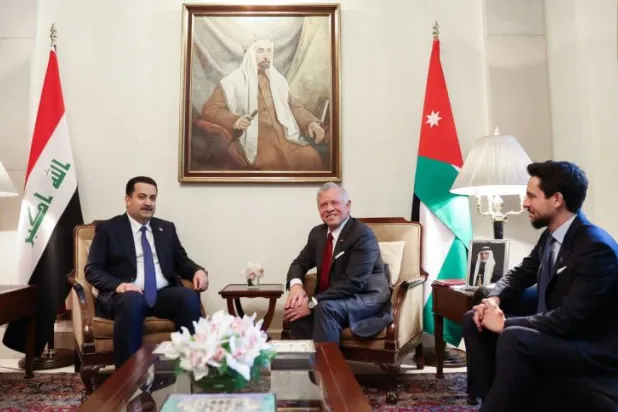 العاهل الأردني الملك عبد الله الثاني خلال استقبال رئيس الوزراء العراقي محمد شياع السوداني اليوم