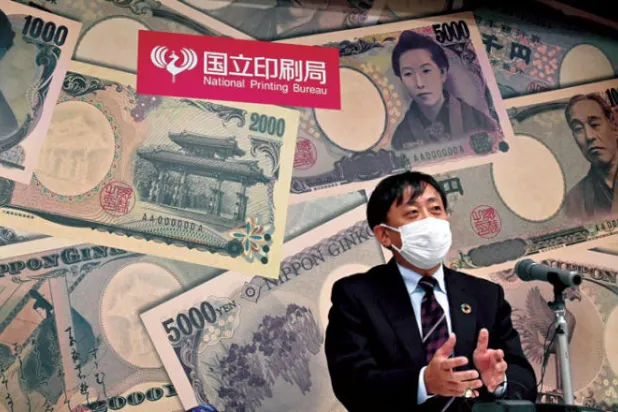 هيرويوكي كانو مدير إدارة العملة في البنك المركزي الياباني خلال مؤتمر صحافي الأسبوع الماضي (أ.ف.ب)