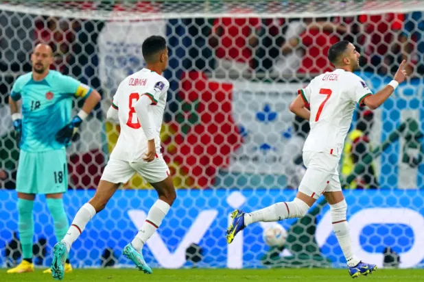 فرحة لاعبي المغرب بثنائيتهم في شباك كندا (د.ب.أ)