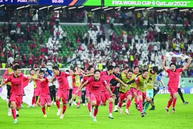 فرحة كورية جنوبية عارمة بعد التأهل إلى الدور الثاني (د.ب.أ)