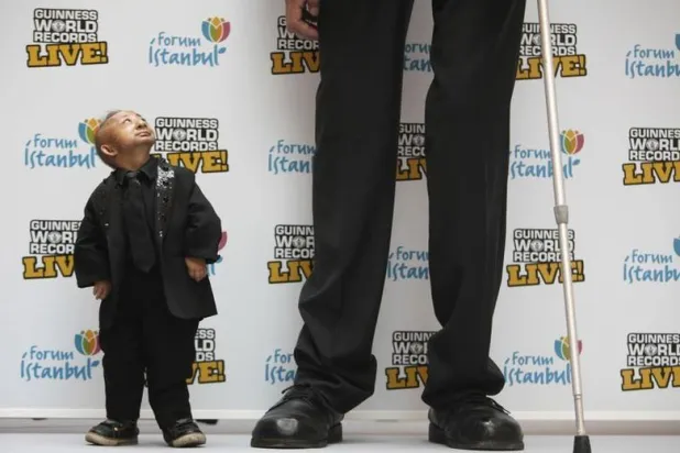 الرجال الأقصر يكونون أكثر عرضة للتصرف بطريقة عدائية تجاه الآخرين (رويترز)