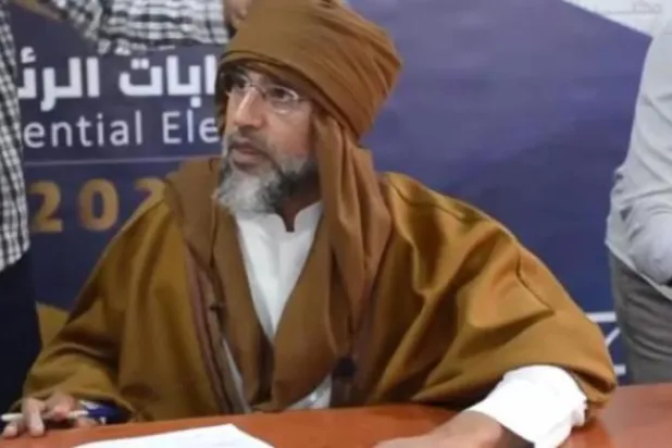 سيف الإسلام القذافي لدى ترشحه للانتخابات الرئاسية في ليبيا نهاية 2021 (مفوضية الانتخابات)