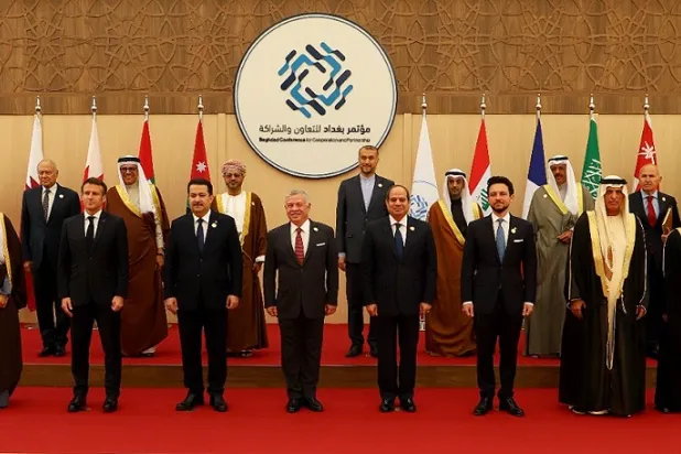 20 December 2022, Jordan, Sweimeh: Leaders pose for the family photo during the Baghdad Conference for Cooperation and Partnership in Sweimeh by the Dead Sea shore in central-west Jordan. (Petra/dpa)