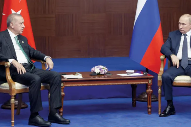 صورة ارشيفية للرئيسين فلاديمير بوتين ورجب طيب اردوغان ( إ.ب.أ)