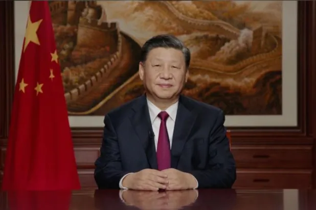 صورة للرئيس الصيني شي جينبينغ اليوم (السبت) في خطابه للصينيين