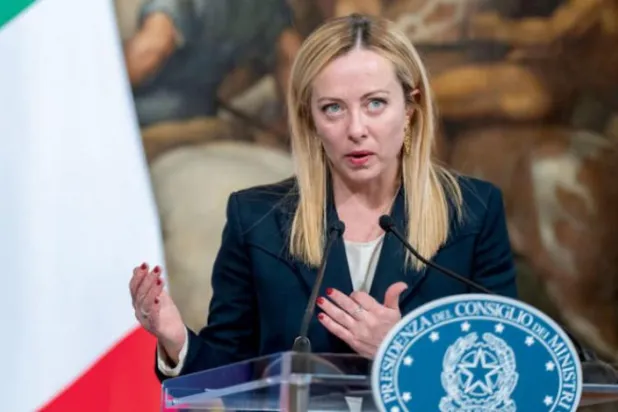 میلونی گزشتہ منگل کو روم میں ایک پریس کانفرنس کے دوران گفتگو کرتے ہوئے (ڈی پی اے)