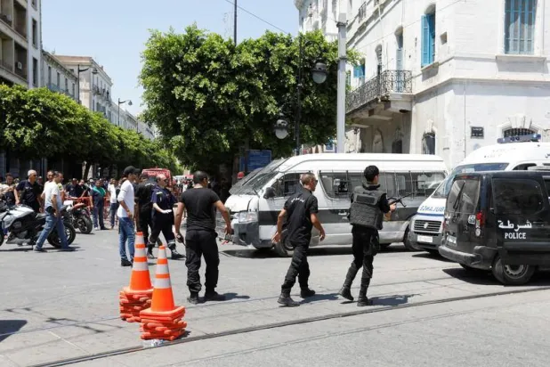 Police officers are seen at the site of an explosion in downtown Tunis, Tunisia, June 27, 2019. REUTERS/Zoubeir Souissi 

