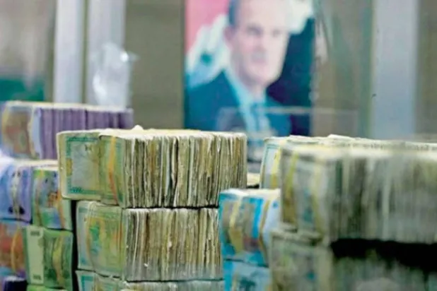 عملات سورية ورقية (أ.ف.ب)