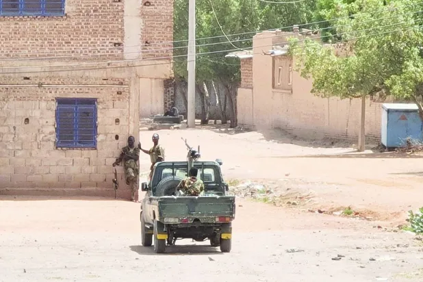 Sudanese army touring a Khartoum neighborhood (AFP)