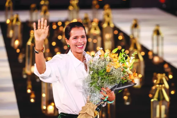 المصممة فضيلة الكادي (أ.ف.ب)