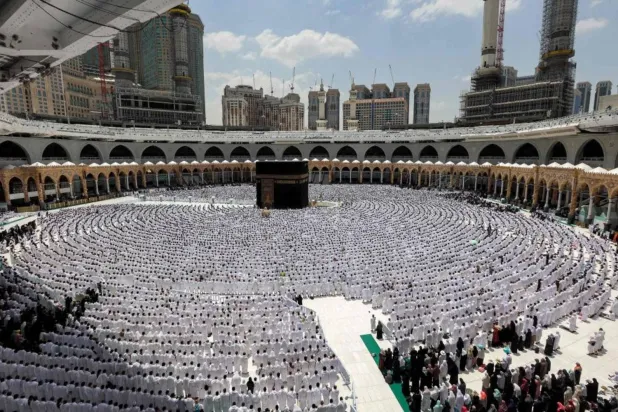Prayers being performed around the Holy Kaaba in the Grand Mosque of Mecca, Saudi Arabia (AFP)