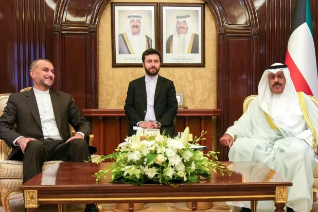 Kuwaiti Prime Minister Sheikh Ahmad Nawaf Al-Ahmad Al-Sabah receives on Wednesday Iranian Foreign Minister Hossein Amir-Abdollahian. (KUNA) 

