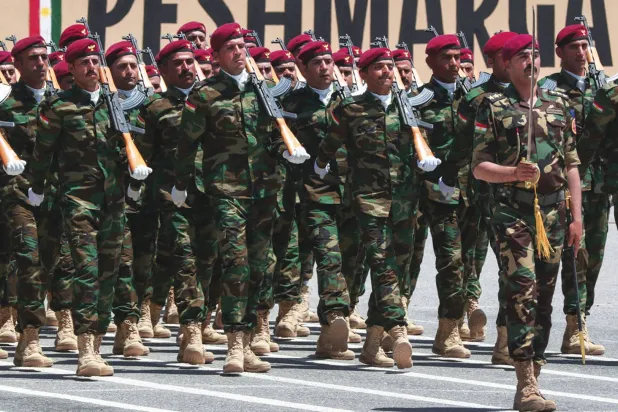 کرد پیشمرگ فورسز گزشتہ جمعرات کے روز صوبہ کردستان کے دارالحکومت اربیل میں ایک تقریب کے دوران (اے ایف پی)