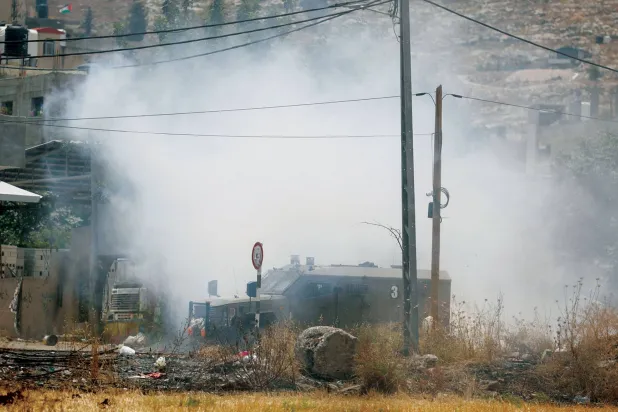 19 جون کو مغربی کنارے کے شہر جنین میں حملے کے دوران ایک اسرائیلی فوجی گاڑی (رائٹرز)