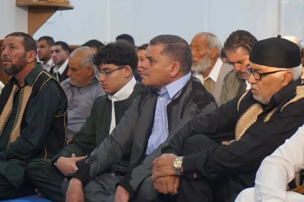 Menfi, Trablus’ta bayram namazını kıldıktan sonra (Başkanlık Konseyi)