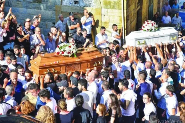 The funeral procession of Haitham Touk and Malik Touk in the town of Bsharri, Lebanon (Twitter)
