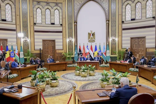 In this photo provided by Egypt's presidency media office, Egyptian President Abdel Fattah el-Sisi, center, chairs a summit on the Sudan conflict, at the Presidential Palace in Cairo, Egypt, Thursday, July 13, 2023. (Egyptian Presidency Media Office via AP)