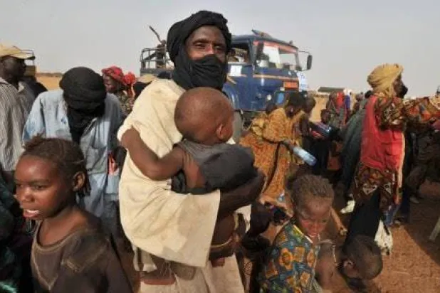 لاجئون ماليون فارون من الصراع المسلح (أ.ف ب)