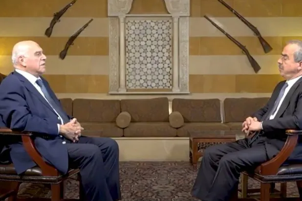 Fares Boueiz and Asharq Al-Awsat Editor-in-Chief Ghassan Charbel during the interview. (Asharq Al-Awsat) 