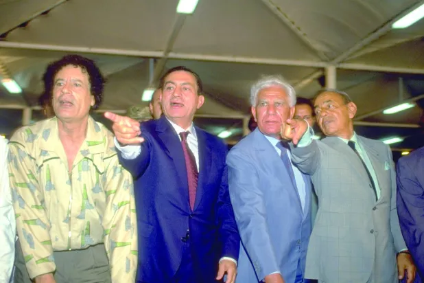 Colonel Gaddafi alongside Arab leaders, including President Hosni Mubarak, President Chadli Bendjedid and King Hassan II, during the inauguration of a reservoir for the waters of the Great Man-made River in Suluq, south of Benghazi in 1991. (Getty Images)