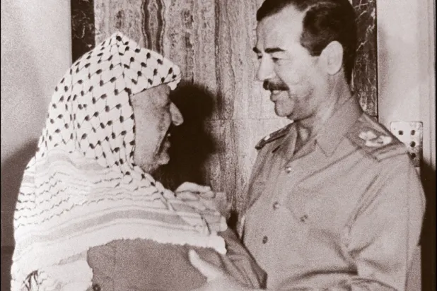 Yaser Arafat ve Saddam Hüseyin. (AFP)