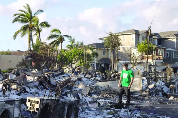 ہفتہ کے روز لاہینا میں آگ لگنے سے ہونے والے نقصان کا منظر (اے ایف پی)